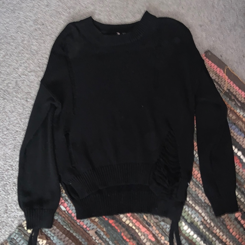 Ripped sweater